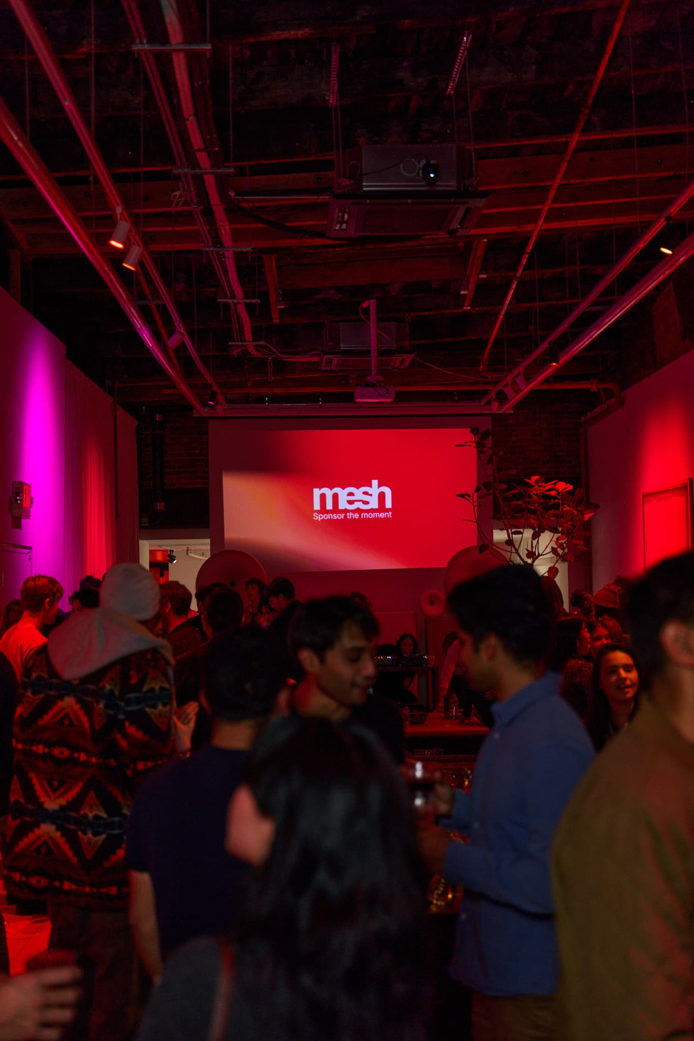 A packed Mesh event beneath the mesh Sponsor the moment projection