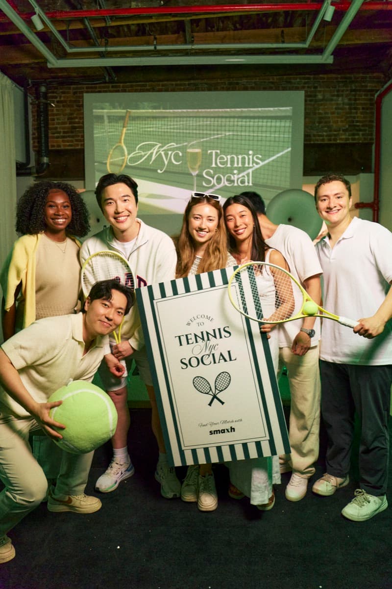 An energetic group with the Tennis Social sign at the SMAXH mixer